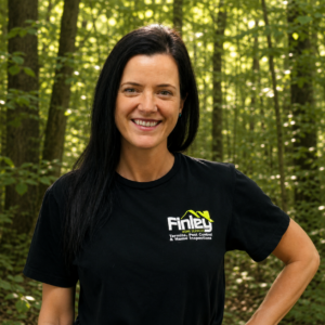 Finley Home Services professional inspecting and evaluating residential property conditions
